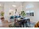 Open concept dining room and kitchen with bright light at 306 Rodarte St, Henderson, NV 89014