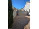 Side yard offers privacy with a block wall and metal gate at 306 Rodarte St, Henderson, NV 89014