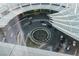 An aerial view shows the property entrance and covered parking, featuring a roundabout with lush landscaping and a fountain at 3726 Las Vegas Blvd # 1805, Las Vegas, NV 89158