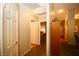 Bright hallway with fresh paint, neutral tones and paneled doors offering a warm welcome at 379 Rosado Springs St, Henderson, NV 89014