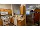 Bright kitchen with a view of the dining area and living room at 379 Rosado Springs St, Henderson, NV 89014