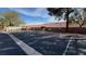 Ample parking space available with well-maintained asphalt and clear lane markings at 379 Rosado Springs St, Henderson, NV 89014