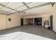 Spacious garage with epoxy flooring, high ceilings, and ample storage space at 3938 E Chaffe Ave, Pahrump, NV 89061