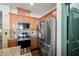 Kitchen with stainless steel appliances and wooden cabinetry at 3938 E Chaffe Ave, Pahrump, NV 89061