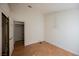 Bedroom with light-colored walls and wood-look flooring at 4032 Rustic Oak Ct, North Las Vegas, NV 89032