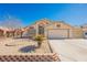 Charming single-Gathering home featuring stucco exterior and a two-car garage, complemented by mature desert landscaping at 4032 Rustic Oak Ct, North Las Vegas, NV 89032