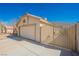 Two-car garage and private gated access to the residence at 4032 Rustic Oak Ct, North Las Vegas, NV 89032