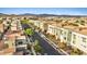 Aerial view of a vibrant neighborhood with modern townhomes and tree-lined streets at 4288 Veraz St, Las Vegas, NV 89135
