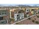 Drone shot of a community of townhomes with mountain views in the background at 4288 Veraz St, Las Vegas, NV 89135