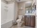 Clean and functional bathroom with a tub/shower combo, modern vanity and toilet at 4288 Veraz St, Las Vegas, NV 89135