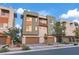 Modern townhome with a two-car garage and desert landscaping at 4288 Veraz St, Las Vegas, NV 89135