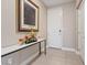 Bright foyer with tile flooring, a console table, and decorative floral arrangement at 4288 Veraz St, Las Vegas, NV 89135