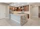 Modern kitchen featuring stainless steel appliances, granite countertops, and a large island at 4288 Veraz St, Las Vegas, NV 89135