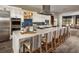Modern kitchen with a large island and stainless steel appliances, perfect for cooking and entertaining at 4288 Veraz St, Las Vegas, NV 89135