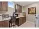 Functional laundry room with ample counter space, modern cabinetry, and convenient access to laundry appliances at 4288 Veraz St, Las Vegas, NV 89135