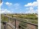 Balcony view overlooking palm trees and a scenic landscape, offering a peaceful outdoor space at 4288 Veraz St, Las Vegas, NV 89135