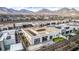 Aerial view of backyard with a putting green and modern landscaping in a desert neighborhood at 472 Sand Dune Arch St, Las Vegas, NV 89138