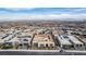 An aerial view of the neighborhood showcasing modern homes with desert landscaping and scenic mountain views at 472 Sand Dune Arch St, Las Vegas, NV 89138