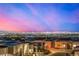 Las Vegas skyline view at sunset from rooftop of modern home at 472 Sand Dune Arch St, Las Vegas, NV 89138