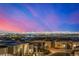 Las Vegas skyline view at sunset from rooftop of modern home at 472 Sand Dune Arch St, Las Vegas, NV 89138