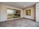 Covered patio with large sliding doors and tile flooring at 472 Sand Dune Arch St, Las Vegas, NV 89138