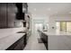 Sleek kitchen featuring modern appliances, stone countertops, and ample cabinet space at 472 Sand Dune Arch St, Las Vegas, NV 89138