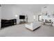 Living room featuring tile flooring, a modern sofa, and a piano at 472 Sand Dune Arch St, Las Vegas, NV 89138