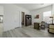 Bright office area with view to a modern bathroom featuring marble tile in shower at 472 Sand Dune Arch St, Las Vegas, NV 89138