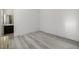 Empty room featuring hardwood floors and access to the bathroom at 472 Sand Dune Arch St, Las Vegas, NV 89138