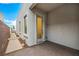 A clean side yard features a paved walkway and a neutral-toned wall, offering a private outdoor space at 472 Sand Dune Arch St, Las Vegas, NV 89138