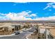 Daytime view of street with modern homes at 472 Sand Dune Arch St, Las Vegas, NV 89138