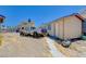 Backyard featuring storage building, vehicle, and walkway at 478 Potomac St, Henderson, NV 89015