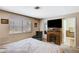 Bedroom featuring natural light streaming through windows and functional desk space at 478 Potomac St, Henderson, NV 89015