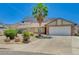 Lovely single-Gathering house boasting a manicured lawn, vibrant greenery, and a convenient two-car garage at 478 Potomac St, Henderson, NV 89015