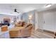 Cozy living room showcasing neutral walls, hardwood floors, and comfortable seating at 478 Potomac St, Henderson, NV 89015