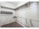 A walk-in closet offers ample storage with shelving and hanging space at 4932 Goldeneye Way, North Las Vegas, NV 89031