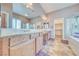 Elegant primary bathroom featuring a double vanity, a glass shower, and a soaking tub at 5295 Acqua Ln, Pahrump, NV 89061