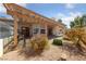 A lovely backyard patio area with comfortable seating and mature landscaping, ideal for relaxation at 544 Cervantes Dr, Henderson, NV 89014