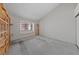 Bedroom with custom wooden shelving and a bright window seat at 544 Cervantes Dr, Henderson, NV 89014