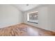 Bedroom with wood flooring, a window bench and a large window at 544 Cervantes Dr, Henderson, NV 89014