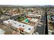 An aerial view of a multi-unit dwelling featuring a shared swimming pool and parking at 5939 Vegas Dr, Las Vegas, NV 89108