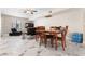 Bright living area with marble-style tile flooring, a ceiling fan, and modern furnishings at 5939 Vegas Dr, Las Vegas, NV 89108