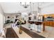 Open-concept living area seamlessly blending kitchen, dining, and living spaces with modern finishes and natural light at 5968 Saint Lazare St, Las Vegas, NV 89130