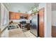 Well-lit kitchen featuring stainless steel appliances and granite countertops at 6412 Yarmouth Dr, Las Vegas, NV 89108