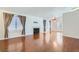 Inviting living room featuring attractive wood floors and a fireplace feature at 6412 Yarmouth Dr, Las Vegas, NV 89108