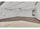 Clean, spacious two-car garage with ample storage and durable flooring at 7083 Mackenzie Bay Ave, Las Vegas, NV 89179