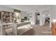 Bright home office featuring built-in shelving, a sleek desk, and neutral tones for a productive workspace at 7083 Mackenzie Bay Ave, Las Vegas, NV 89179