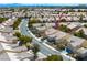 Bird's eye view of a residential neighborhood with many homes featuring desert landscaping at 7757 Coast Jay St, North Las Vegas, NV 89084