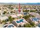 Aerial view of a house in a residential neighborhood featuring desert landscaping and solar panels at 7757 Coast Jay St, North Las Vegas, NV 89084