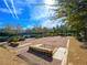 A well-kept community bocce ball court featuring authentic timber benches nestled within a meticulously landscaped setting at 7757 Coast Jay St, North Las Vegas, NV 89084